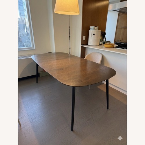 Used BoConcept Kingston Dark Brown Wood Dining Table for sale on AptDeco