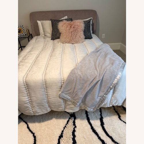 Used West Elm Pink Lana Upholstered Queen Bed for sale on AptDeco