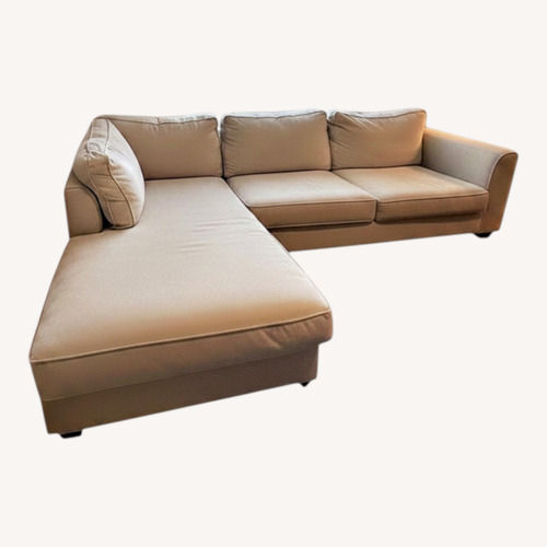 Used Jordan’s Light Beige Sectional Sofa with Chaise for sale on AptDeco