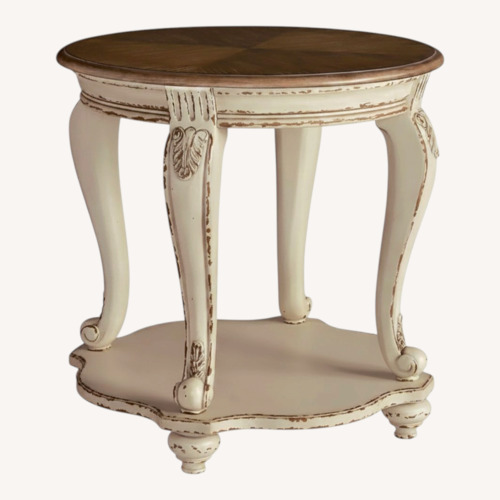 Used Ashley Furniture Realyn Natural Wood Side Table for sale on AptDeco