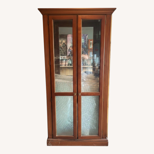 Used Antique Curio Cabinet for sale on AptDeco