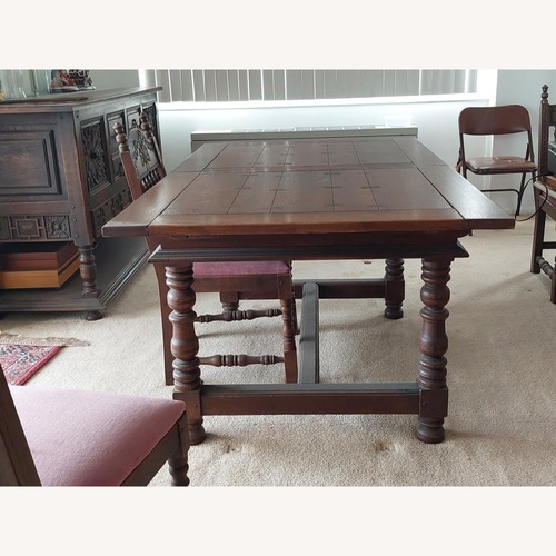 Used Dark Brown Dining Table for sale on AptDeco