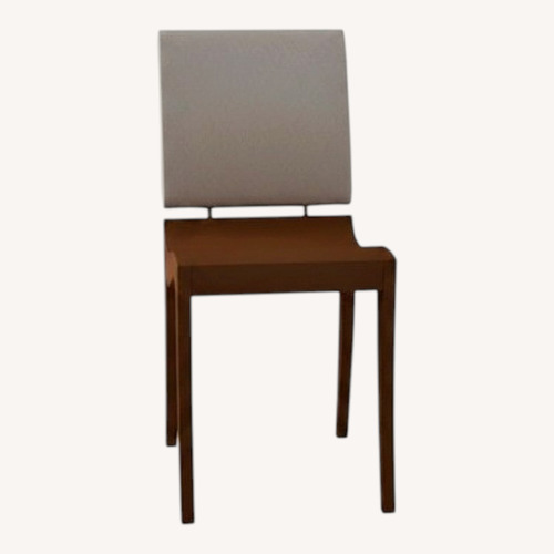 Used Ligne Roset Finn Dark Brown Wood Dining Chairs for sale on AptDeco