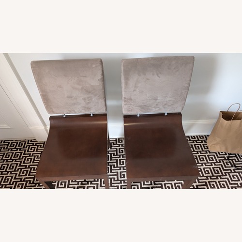 Used Ligne Roset Finn Dark Brown Wood Dining Chairs for sale on AptDeco