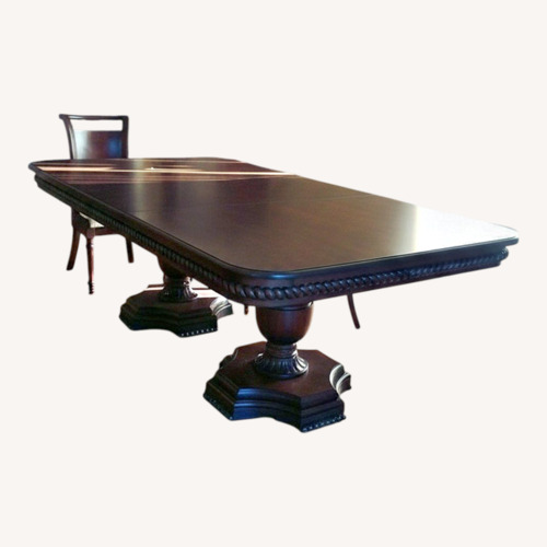 Used Dark Brown Solid Dining Table for sale on AptDeco