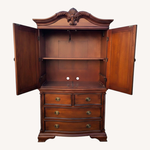 Used Dark Brown Wood Armoire  for sale on AptDeco