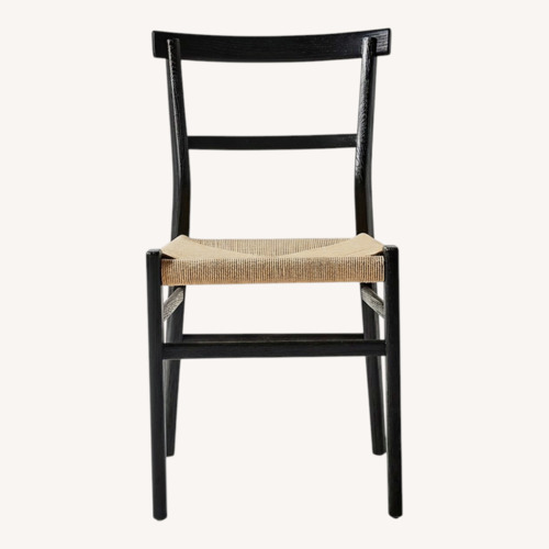 Used Anthropologie Black Wood Dining Chairs for sale on AptDeco