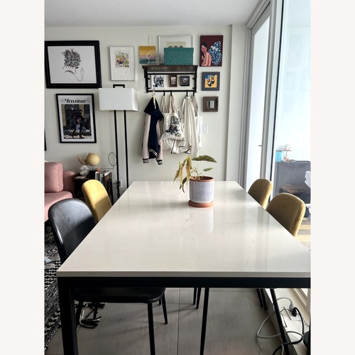 Used Room & Board Parsons Ecru Quartz Dining Table for sale on AptDeco