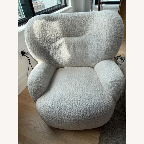 Used Loll Designs White Boucle Swivel Armchair for sale on AptDeco