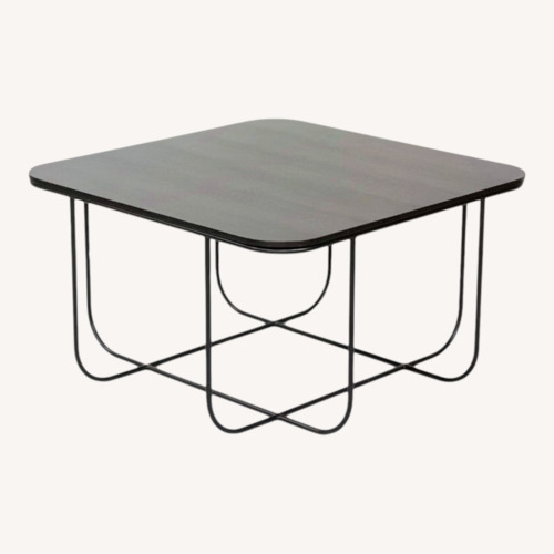 Used Menu Cage Table Black Wood Coffee Table for sale on AptDeco