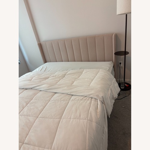 Used Cream Wood Queen Bed for sale on AptDeco