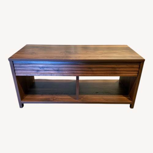 Used World Market Natural Wood Veneer Coffee Table for sale on AptDeco