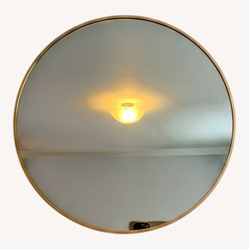 Used Gold Glass Wall Mirror for sale on AptDeco