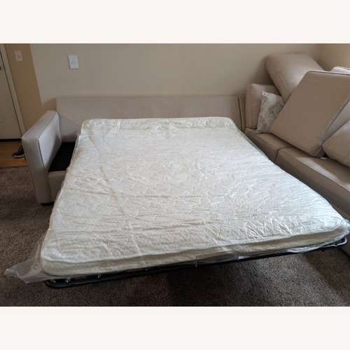 Used Mathers Cream Beige White Fabric 125" 2 Piece L-Shaped Sectional for sale on AptDeco