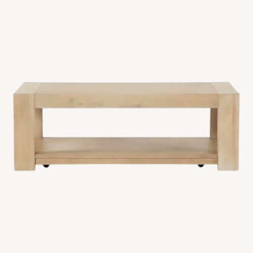 Used Living Spaces Natural Wood Coffee Table for sale on AptDeco