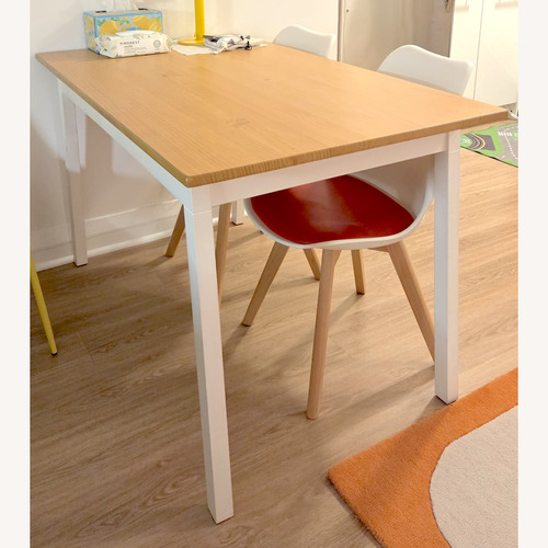 Used IKEA Pinntorp Natural Wood Dining Table for sale on AptDeco