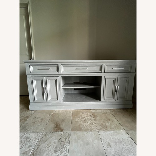 Used Rooms To Go Stephenson Light Gray Media Console for sale on AptDeco