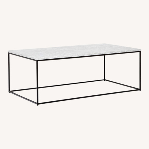 Used West Elm White Marble Streamline Rectangle Coffee Table (44") for sale on AptDeco