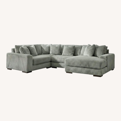 Used Ashley Furniture Gray 3+ Piece Sectional/Ottoman for sale on AptDeco