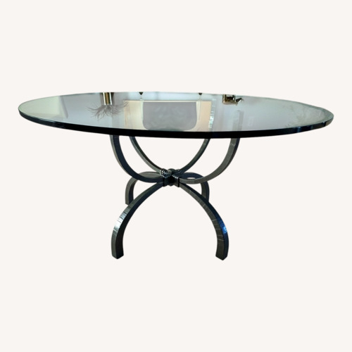 Used Dark Gray Metal Dining Table for sale on AptDeco