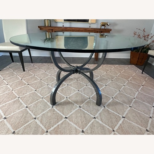 Used Dark Gray Metal Dining Table for sale on AptDeco