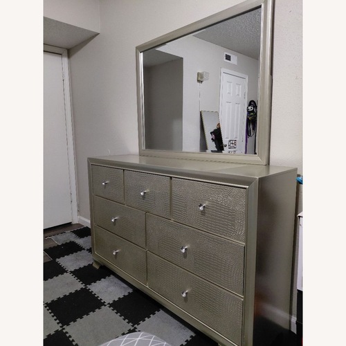 Used Ashley Furniture Dark Gray wood dresser for sale on AptDeco