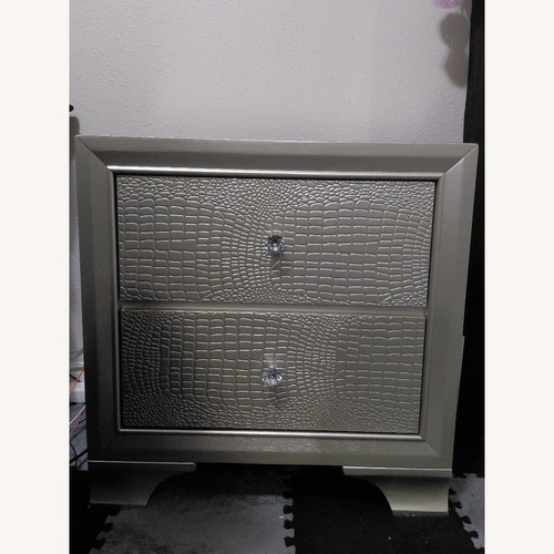 Used Ashley Furniture Dark Gray Wood Nightstand for sale on AptDeco