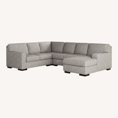 Used Ashley Furniture Ashlor Nuvella 4-Piece Sectional with Chaise for sale on AptDeco