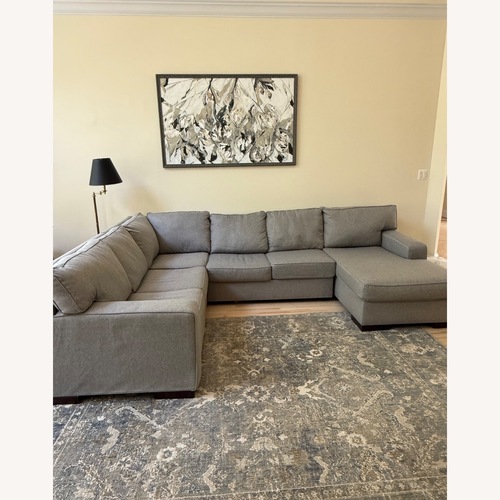 Used Ashley Furniture Ashlor Nuvella 4-Piece Sectional with Chaise for sale on AptDeco