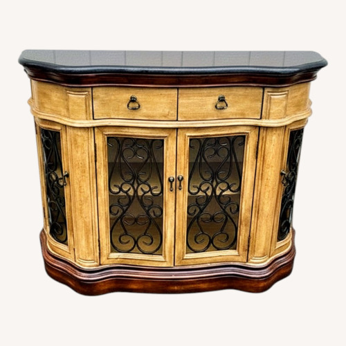 Used Cabinet with Granite Top and Wrought Iron Doors for sale on AptDeco