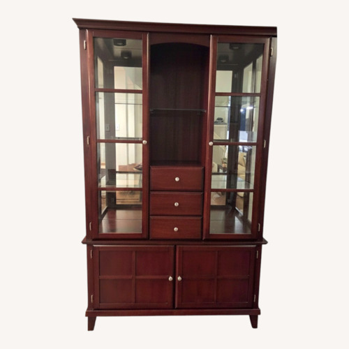 Used Dark Brown Wood Curio Cabinet  for sale on AptDeco