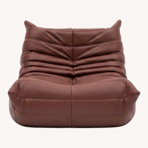 Used Togo Fireside Chair and Ottoman for sale on AptDeco