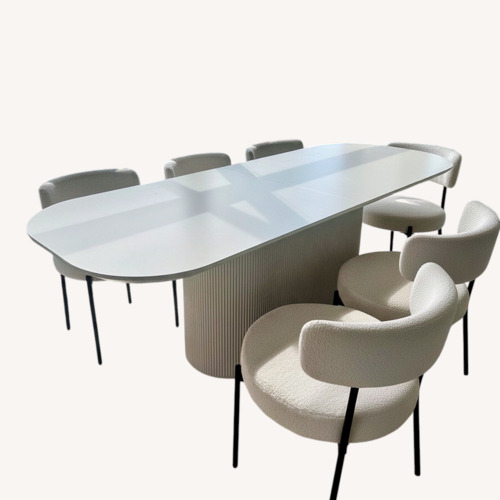 Used White Fluted Oval Dining Set W 6 Chairs for sale on AptDeco