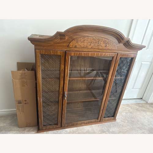 Used Antique Glass Door Cabinet With Interior Lighting for sale on AptDeco