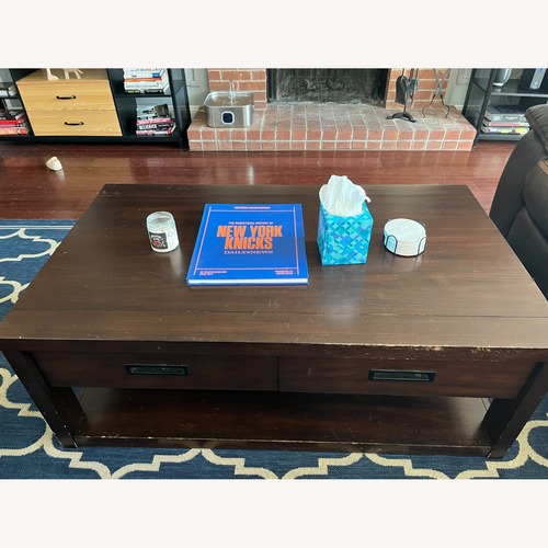 Used Bob's Discount Furniture Dark Brown Coffee Table for sale on AptDeco