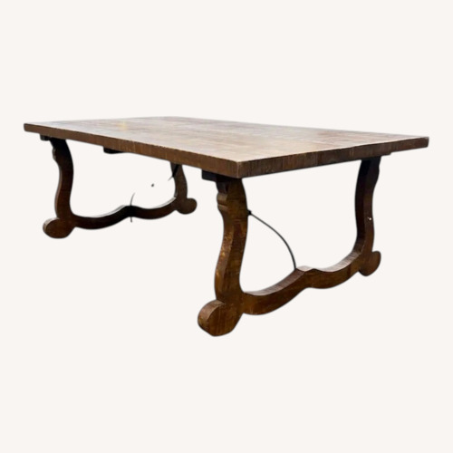 Used  Solid Wood Trestle Dining Table for sale on AptDeco