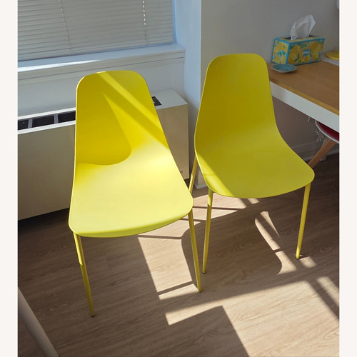 Used Article Svelti Yellow Dining Chairs for sale on AptDeco