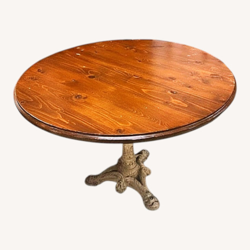 Used 40" Round Dark Wood Top Dining Table for sale on AptDeco