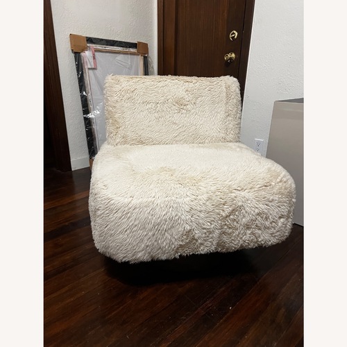 Used Fur Fabric Swivel Accent Chair with Wood Base for sale on AptDeco