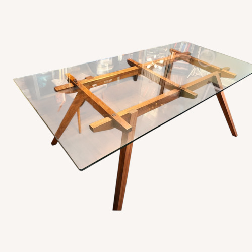 Used Organic Modernism Amsterdam Natural Glass Top Dining Table for sale on AptDeco