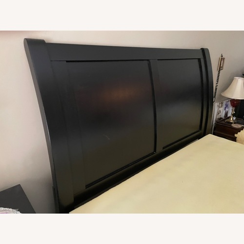 Used Ashley Millennium Queen Bed Frame for sale on AptDeco