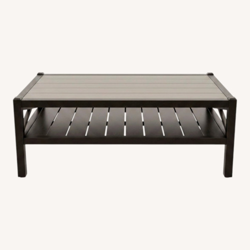 Used Gray Wash Industrial X-Frame Coffee Table for sale on AptDeco