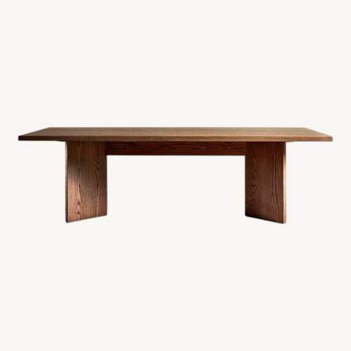 Used Dark Brown Oak Wood Dining Table for sale on AptDeco