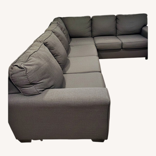 Used Living Spaces Dark Gray Fabric 2 Piece Sectional for sale on AptDeco