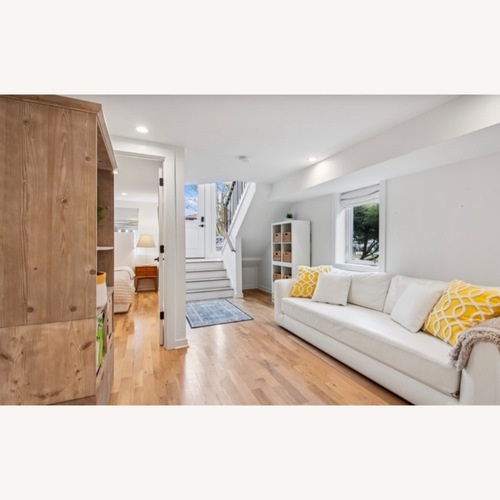 Used Rove Concepts White Faux Leather Sleeper Sofa for sale on AptDeco