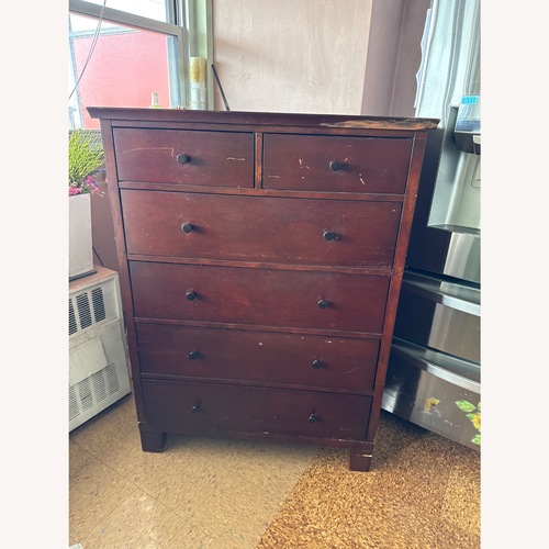 Used Pottery Barn Valencia Tall Dark Brown Wood Dresser for sale on AptDeco