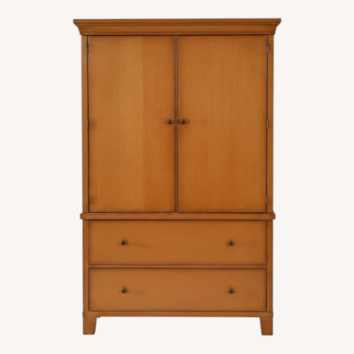 Used Pottery Barn Valencia Light Brown Wood Armoire for sale on AptDeco