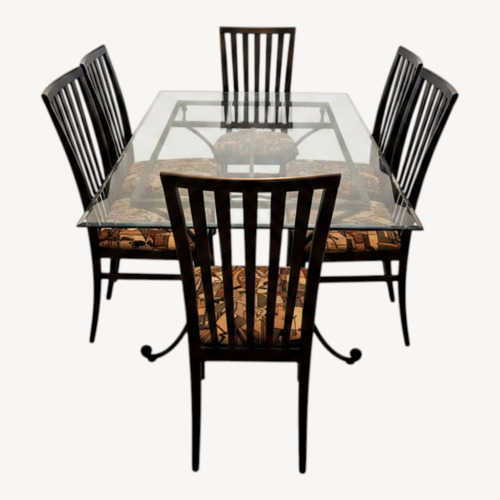 Used Bevel Edged Black Dining Set for sale on AptDeco