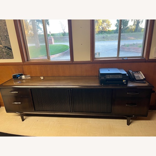 Used Vintage/Antique Dark Brown Wood Credenza for sale on AptDeco