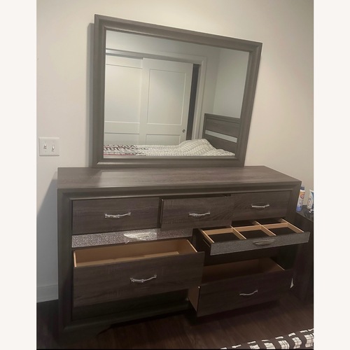 Used Raymour & Flanigan Dresser and Mirror Set for sale on AptDeco